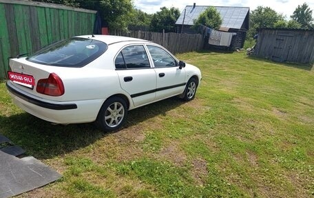 Mitsubishi Carisma I, 2003 год, 390 000 рублей, 2 фотография