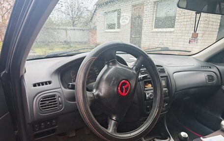 Mazda 323, 1999 год, 350 000 рублей, 5 фотография