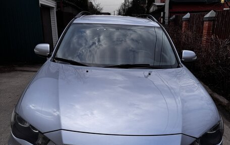 Mitsubishi Outlander III рестайлинг 3, 2010 год, 950 000 рублей, 1 фотография