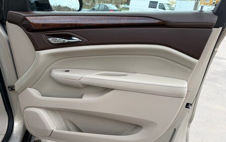 Cadillac SRX II рестайлинг, 2011 год, 1 300 000 рублей, 23 фотография