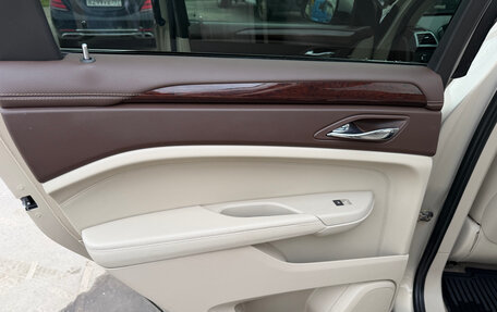 Cadillac SRX II рестайлинг, 2011 год, 1 300 000 рублей, 24 фотография