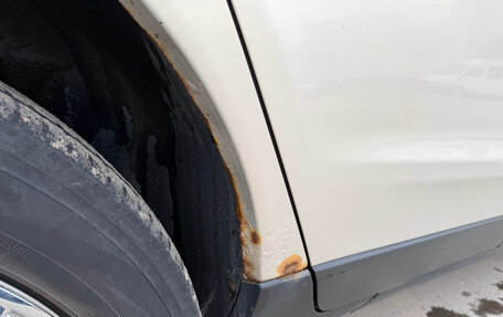 Cadillac SRX II рестайлинг, 2011 год, 1 300 000 рублей, 34 фотография