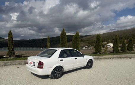 Mazda Familia, 2001 год, 300 000 рублей, 2 фотография