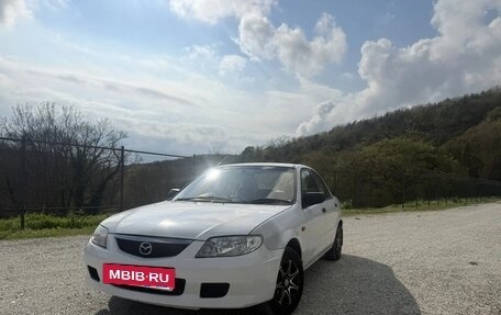 Mazda Familia, 2001 год, 300 000 рублей, 4 фотография
