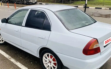 Mitsubishi Mirage VI рестайлинг, 1998 год, 250 000 рублей, 3 фотография