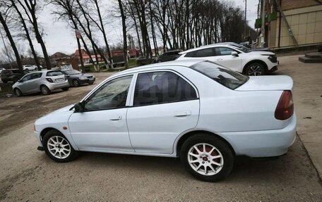 Mitsubishi Mirage VI рестайлинг, 1998 год, 250 000 рублей, 16 фотография