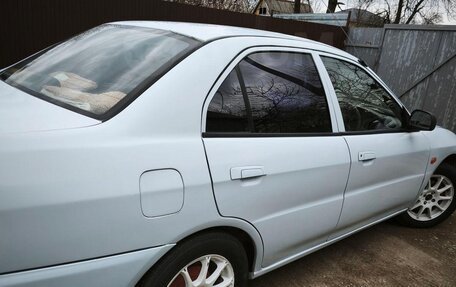 Mitsubishi Mirage VI рестайлинг, 1998 год, 250 000 рублей, 12 фотография