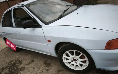 Mitsubishi Mirage VI рестайлинг, 1998 год, 250 000 рублей, 14 фотография