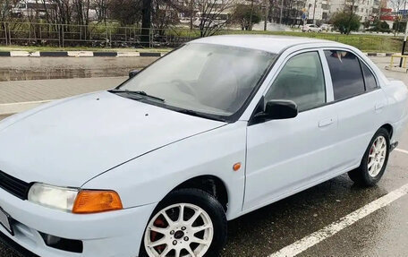 Mitsubishi Mirage VI рестайлинг, 1998 год, 250 000 рублей, 24 фотография