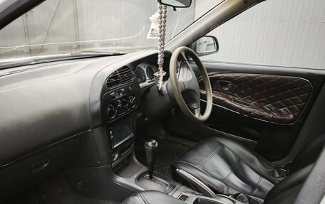 Mitsubishi Mirage VI рестайлинг, 1998 год, 250 000 рублей, 27 фотография