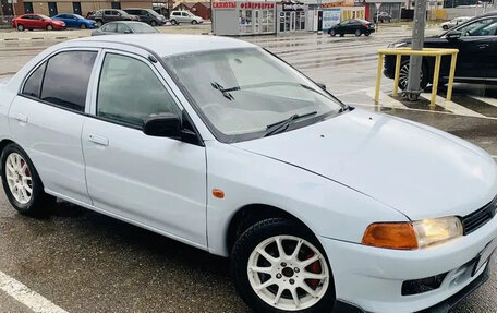 Mitsubishi Mirage VI рестайлинг, 1998 год, 250 000 рублей, 22 фотография