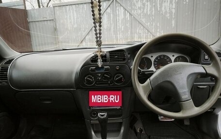 Mitsubishi Mirage VI рестайлинг, 1998 год, 250 000 рублей, 26 фотография
