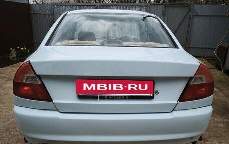 Mitsubishi Mirage VI рестайлинг, 1998 год, 250 000 рублей, 18 фотография