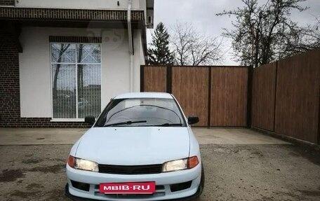 Mitsubishi Mirage VI рестайлинг, 1998 год, 250 000 рублей, 21 фотография