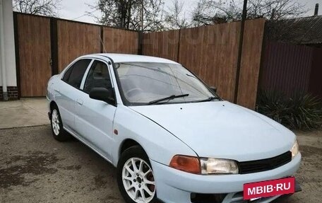 Mitsubishi Mirage VI рестайлинг, 1998 год, 250 000 рублей, 17 фотография