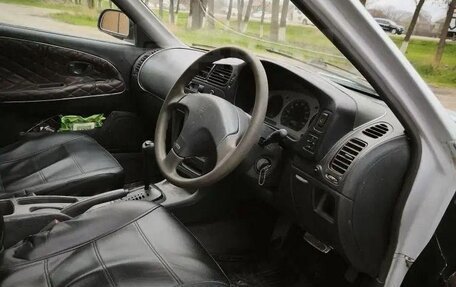 Mitsubishi Mirage VI рестайлинг, 1998 год, 250 000 рублей, 29 фотография
