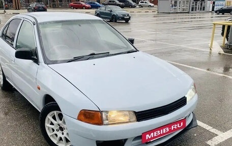 Mitsubishi Mirage VI рестайлинг, 1998 год, 250 000 рублей, 23 фотография