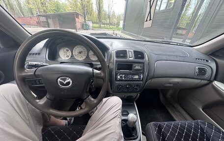Mazda 323, 2003 год, 210 000 рублей, 9 фотография