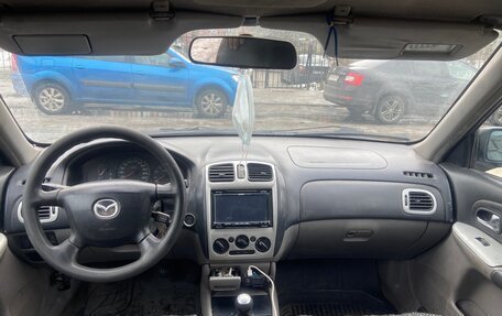 Mazda 323, 2002 год, 323 000 рублей, 10 фотография