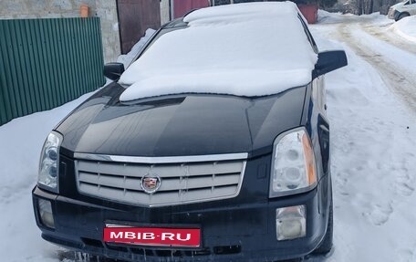 Cadillac SRX II рестайлинг, 2009 год, 800 000 рублей, 1 фотография