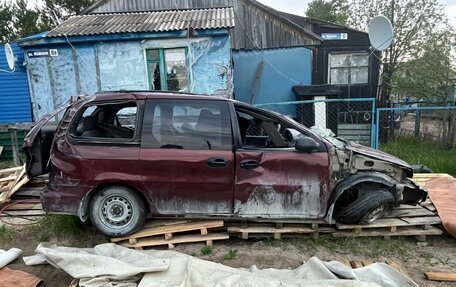 KIA Carnival III, 2000 год, 150 000 рублей, 3 фотография