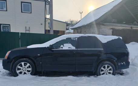 Cadillac SRX II рестайлинг, 2009 год, 800 000 рублей, 3 фотография