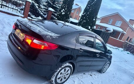 KIA Rio III рестайлинг, 2013 год, 750 000 рублей, 17 фотография