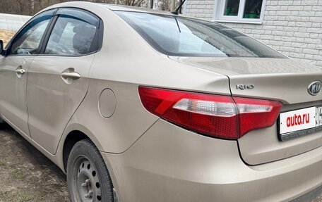 KIA Rio III рестайлинг, 2011 год, 850 000 рублей, 10 фотография