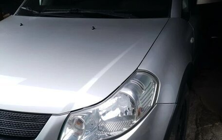 Suzuki SX4 II рестайлинг, 2007 год, 800 000 рублей, 24 фотография