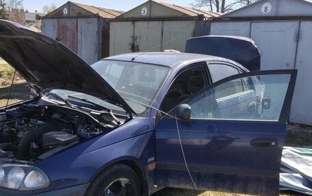 Toyota Avensis III рестайлинг, 1999 год, 150 000 рублей, 7 фотография