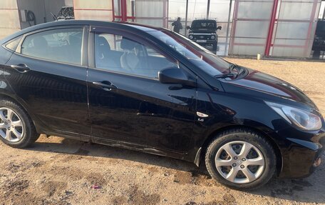 Hyundai Solaris II рестайлинг, 2013 год, 670 000 рублей, 3 фотография