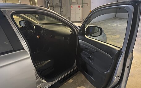 Mitsubishi Outlander III рестайлинг 3, 2013 год, 1 070 000 рублей, 11 фотография