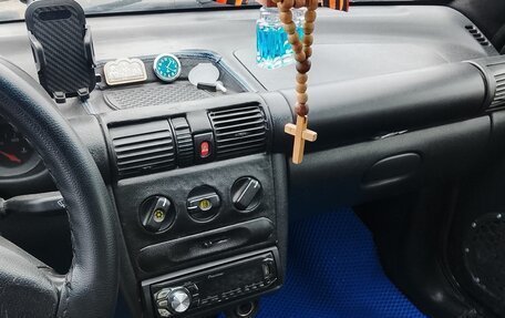 Opel Tigra, 1999 год, 280 000 рублей, 14 фотография