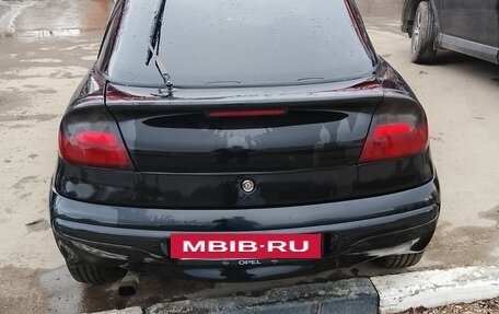 Opel Tigra, 1999 год, 280 000 рублей, 11 фотография