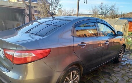 KIA Rio III рестайлинг, 2012 год, 677 000 рублей, 3 фотография