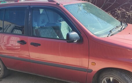 Toyota Raum I, 1998 год, 349 000 рублей, 2 фотография