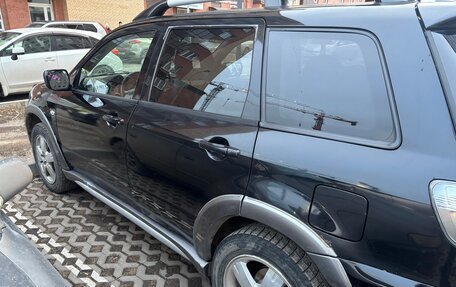 Mitsubishi Outlander III рестайлинг 3, 2004 год, 700 000 рублей, 5 фотография