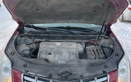 Cadillac SRX II рестайлинг, 2013 год, 1 600 000 рублей, 28 фотография