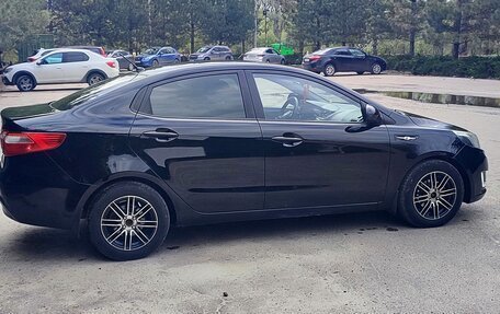 KIA Rio III рестайлинг, 2012 год, 1 050 000 рублей, 2 фотография