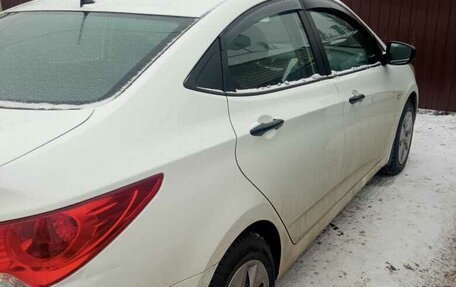 Hyundai Solaris II рестайлинг, 2011 год, 675 000 рублей, 7 фотография