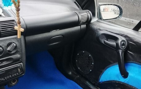 Opel Tigra, 1999 год, 280 000 рублей, 10 фотография