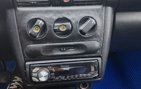 Opel Tigra, 1999 год, 280 000 рублей, 16 фотография