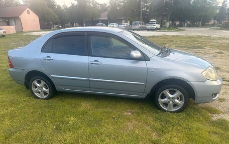 Toyota Corolla, 2004 год, 680 000 рублей, 3 фотография