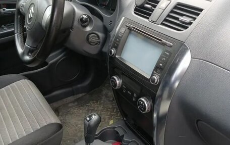 Suzuki SX4 II рестайлинг, 2010 год, 900 000 рублей, 16 фотография