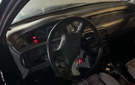 Mazda 626, 1994 год, 12 фотография