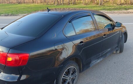 Volkswagen Jetta VI, 2012 год, 849 000 рублей, 5 фотография