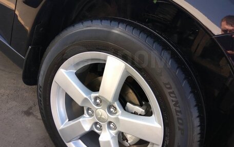 Mitsubishi Outlander III рестайлинг 3, 2012 год, 1 590 000 рублей, 11 фотография