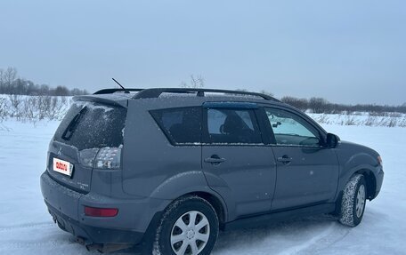 Mitsubishi Outlander III рестайлинг 3, 2011 год, 969 875 рублей, 11 фотография