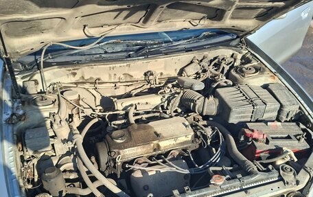 Mitsubishi Mirage VI рестайлинг, 1998 год, 150 000 рублей, 9 фотография