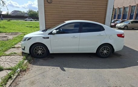 KIA Rio III рестайлинг, 2012 год, 750 000 рублей, 2 фотография